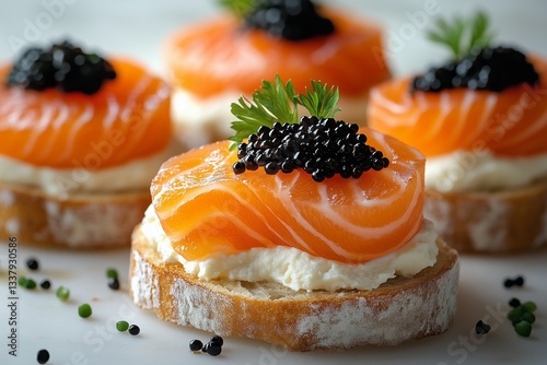 Canapes with smoked salmon and caviar. Closeup of delicious canapes with salmon and caviar 