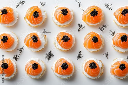 Canapes with smoked salmon and caviar. Closeup of delicious canapes with salmon and caviar 