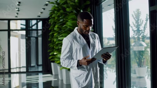 The Doctor Using a Tablet