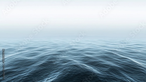 Serene Ocean Waves Under a Misty Sky