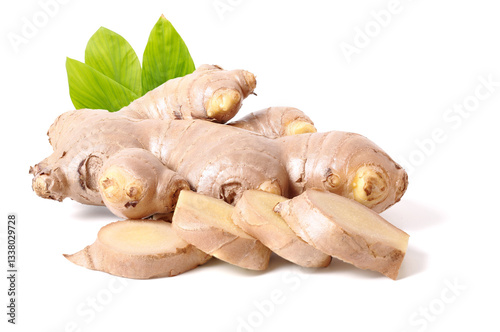 fresh ginger slices with green leaves. isolated on white background.