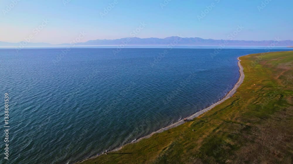 4k Video Aerial Photography Xinjiang Sayram Lake Scenic Landscape With Serene Waters and Mountains 4k Video Aerial Photography Xinjiang Sayram Lake Scenic Landscape With Serene Waters and Mountains