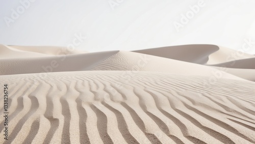 Fototapeta Naklejka Na Ścianę i Meble -  Sand dunes set apart against a white background