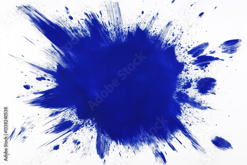 A vibrant blue paint splash creating an artistic effect on a white canvas.