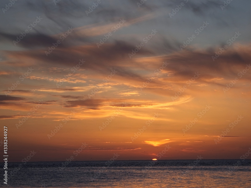 Fototapeta premium Sunset over The Wash, Norfolk, UK.