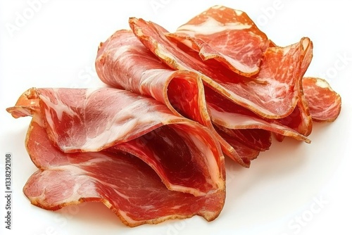 Delicious sliced speck alpine cured ham in a rustic style Italian delicatessen with light background