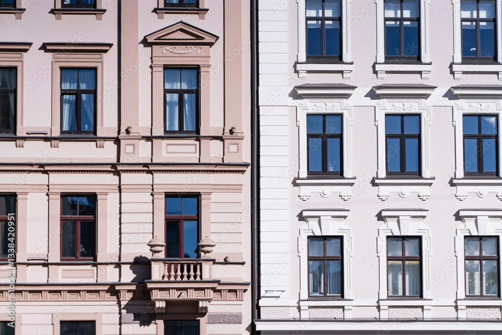 Fototapeta premium Riga Latvia historic center apartment flat buildings. Properties in city center. building windows of changing economy