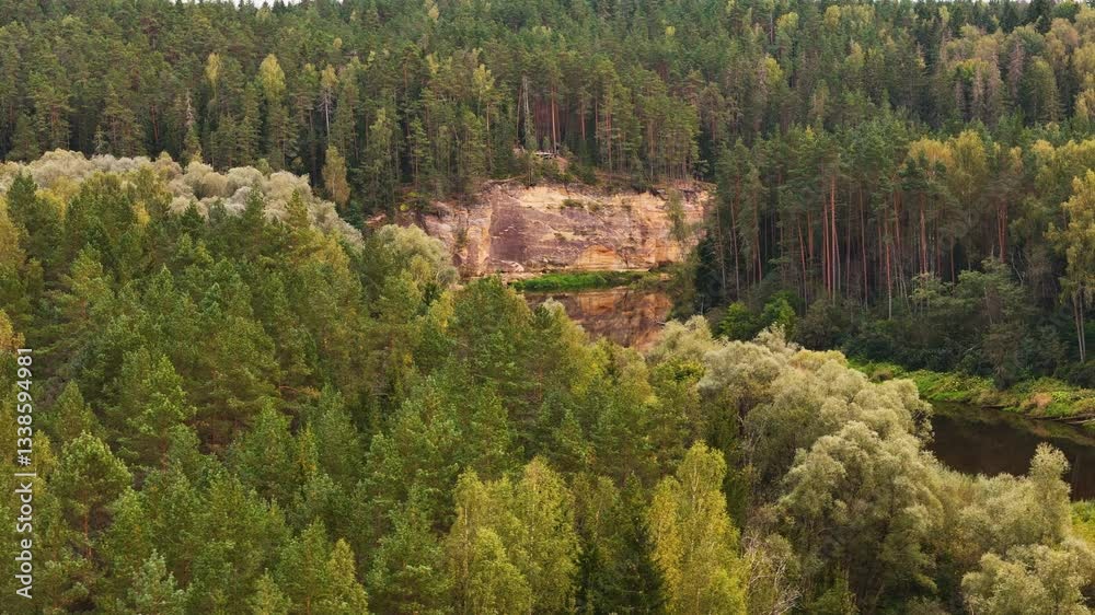 Gauja National Park. 4K Aerial Drone Footage Revealing Devonian Rock Formations Preserved For Millions Of Years In The Baltic Wilderness Of Latvia. A Major Tourist Attraction In Northern Europe.