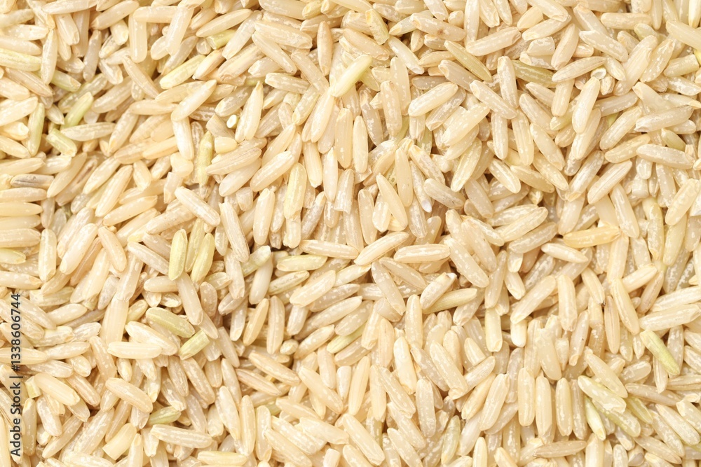Pile of brown rice as background, top view Pile of brown rice as background, top view