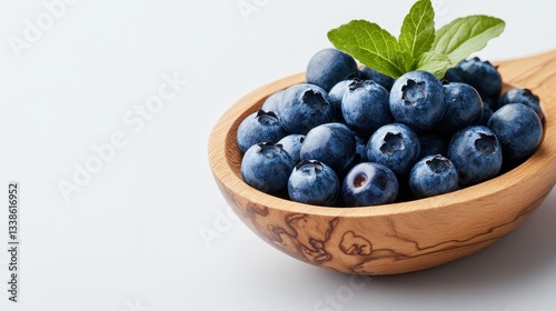 Wallpaper Mural Vibrant blueberries captured in a beautifully crafted wooden bowl, showcasing their freshness and rich color, making it an appealing sight for health enthusiasts. Torontodigital.ca