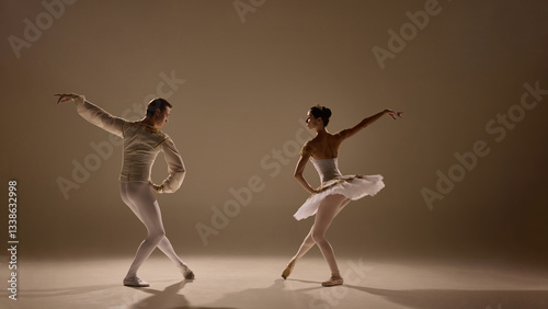 Photos Ballet duet flows together, arms extended, legs poised, every movement controlled yet weightless, captured in glowing light