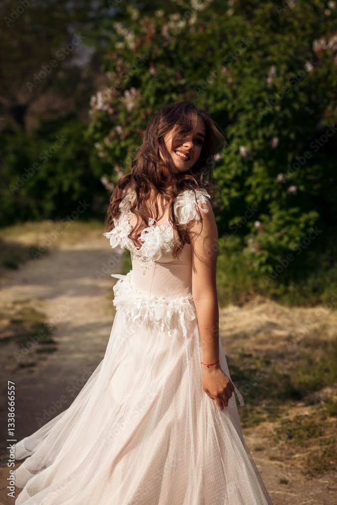 Stunning bride gracefully poses in a spring park, among blossoming trees. exuding elegance, Stunning bride gracefully poses in a spring park, among blossoming trees. exuding elegance,