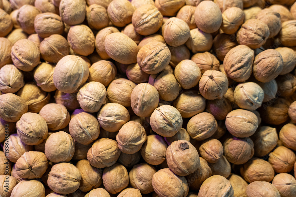 Natural Harvest: A Close-Up of Organic Walnuts in Their Shells Natural Harvest: A Close-Up of Organic Walnuts in Their Shells
