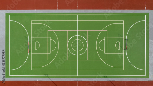 Aerial view of a green and multipurpose playing field. The field is empty.