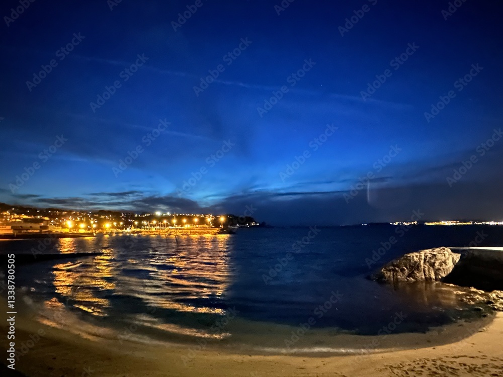Blue hour view of the harbour under a moody sky, Bueu, Galicia, Spain, April 2024
