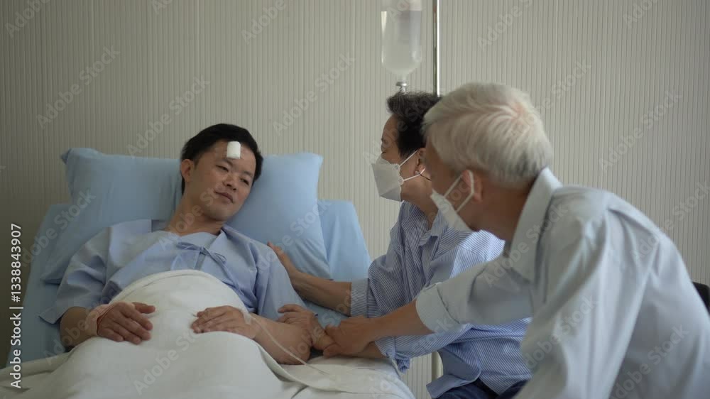 Asian senior parents pay visit adult son worry child injure in hospital bed 4k Asian senior parents pay visit adult son worry child injure in hospital bed 4k