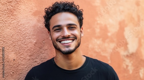 Smiling Brazilian man in casual attire.