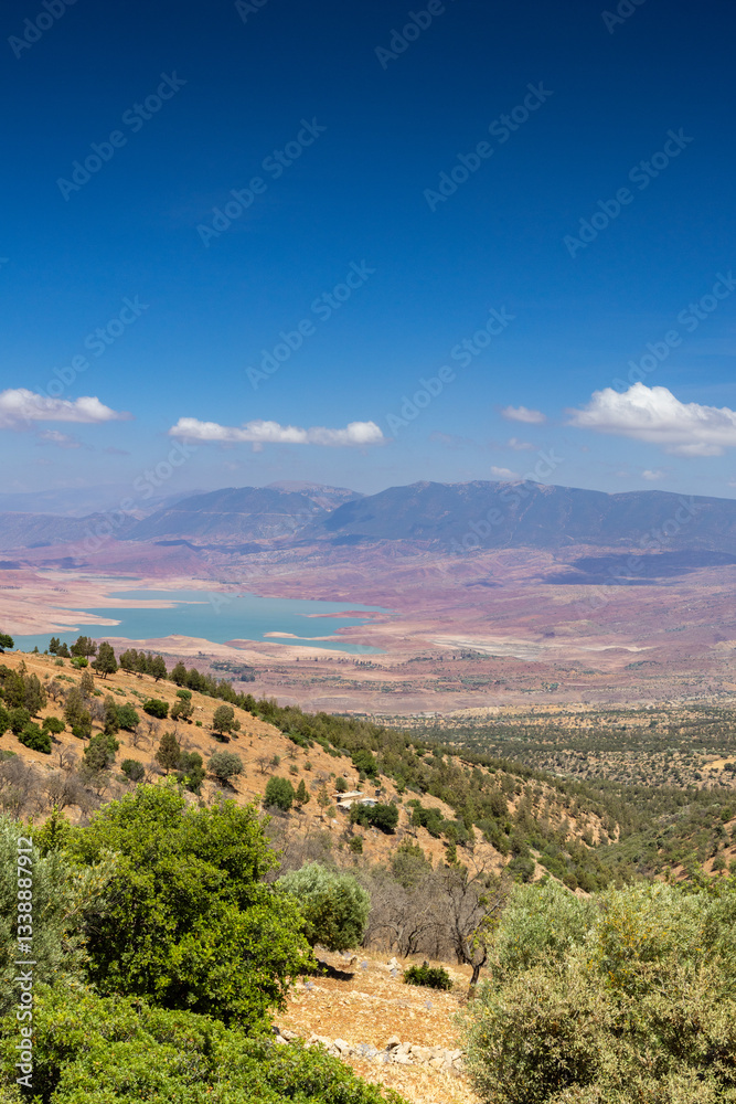 Fototapeta premium The Bin el Ouidane Dam is an arch dam on the El-Abid River in Azilal Province, Morocco