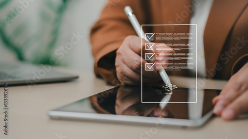 Obraz na płótnie Digital document signing and online contract approval concept. User signs electronically on tablet, digital checklists, e-signature technology, business agreement, and secure verification. w salonie