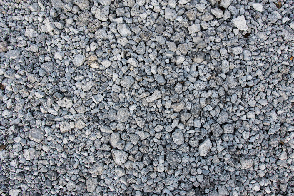 A textured surface of small gray gravel stones, perfect for industrial, natural, or design use. Ideal for landscaping, construction, and earthy themes. A textured surface of small gray gravel stones, perfect for industrial, natural, or design use. Ideal for landscaping, construction, and earthy themes.