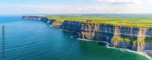 Seaside cliffs landscapes idea. A breathtaking view of coastal cliffs meeting the serene ocean under a clear sky. photo