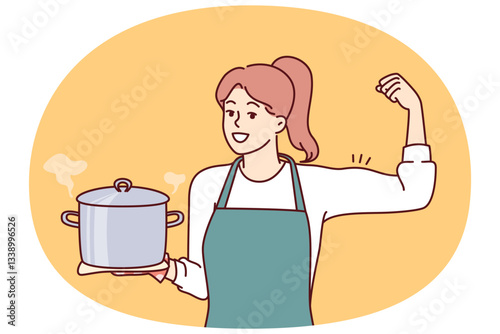 Woman cook holds pot of soup and shows biceps as sign of pride in ability to cook complex dish. Girl housewife in apron smiles inviting to eat delicious homemade food from healthy ingredients