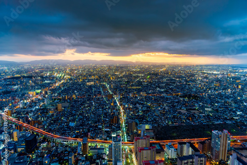 Cityscape of Osaka city Japan at sunset, Osaka skyline in twilight light.