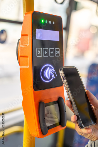 Paying for public transport by card. Public transport. Contactless fare payment.