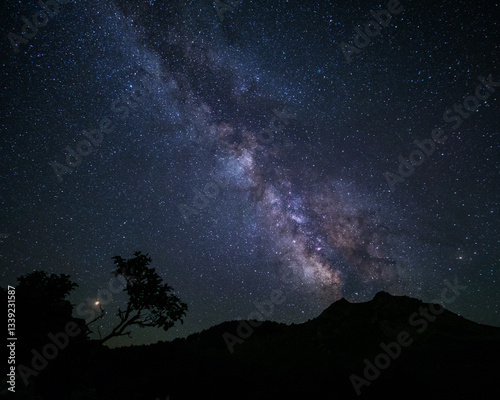 Starry night sky - Milky way above the mountain
