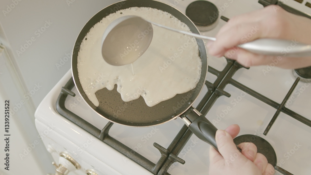 Obraz premium Using a nonstick pan on the gas stove is a great option for quick and easy cooking