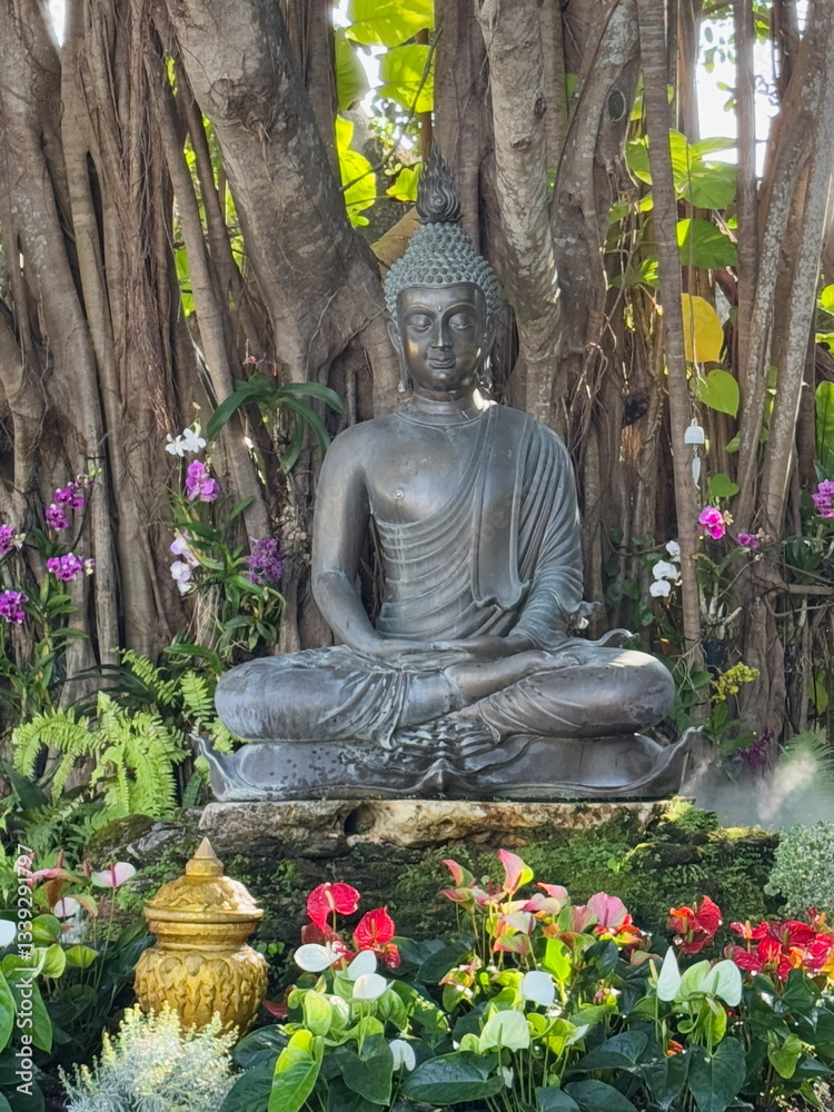 Statue of sitting Buddha in the White Temple in Thailand