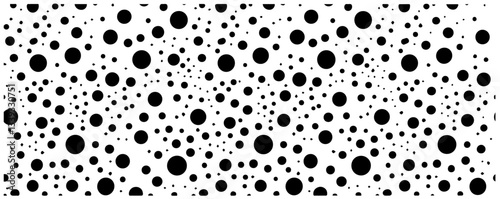 seamless pattern of black dots in various sizes arranged in geometric repetition