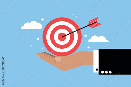 Businessman hand holding a target, business and goal concept
