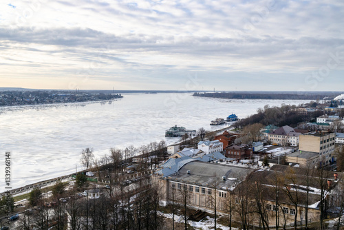 view of river embankment and piers in Kostroma photo