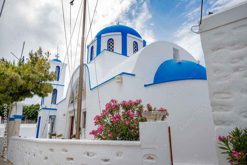 Greek church with blue dome in the Old Town (Chora) of Ano Koufonisi. Small Cyclades, Greece