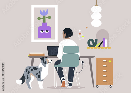 Designer focuses on a laptop in a cozy setup adorned with stylish decor, while an inquisitive dog stands nearby, creating a warm atmosphere perfect for creativity