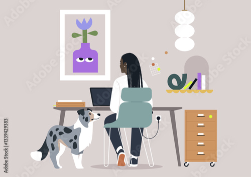 Designer focuses on a laptop in a cozy setup adorned with stylish decor, while an inquisitive dog stands nearby, creating a warm atmosphere perfect for creativity