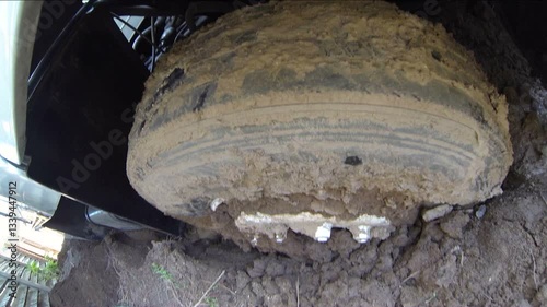 Box Truck Wheel Stuck in Mud