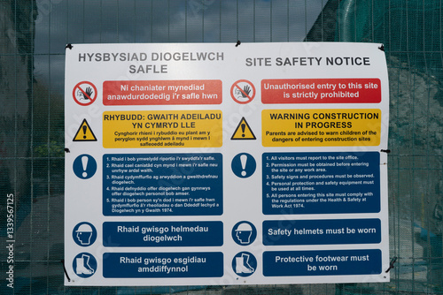 Bilingual site safety sign in English and Welsh.