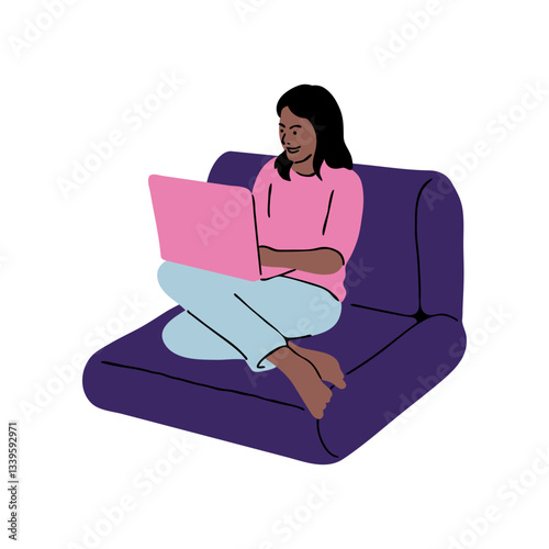 Woman working on a laptop on a couch