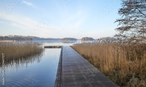 Wooden pier on Lake Barlinek, West Pomeranian Voivodeship, Poland. photo