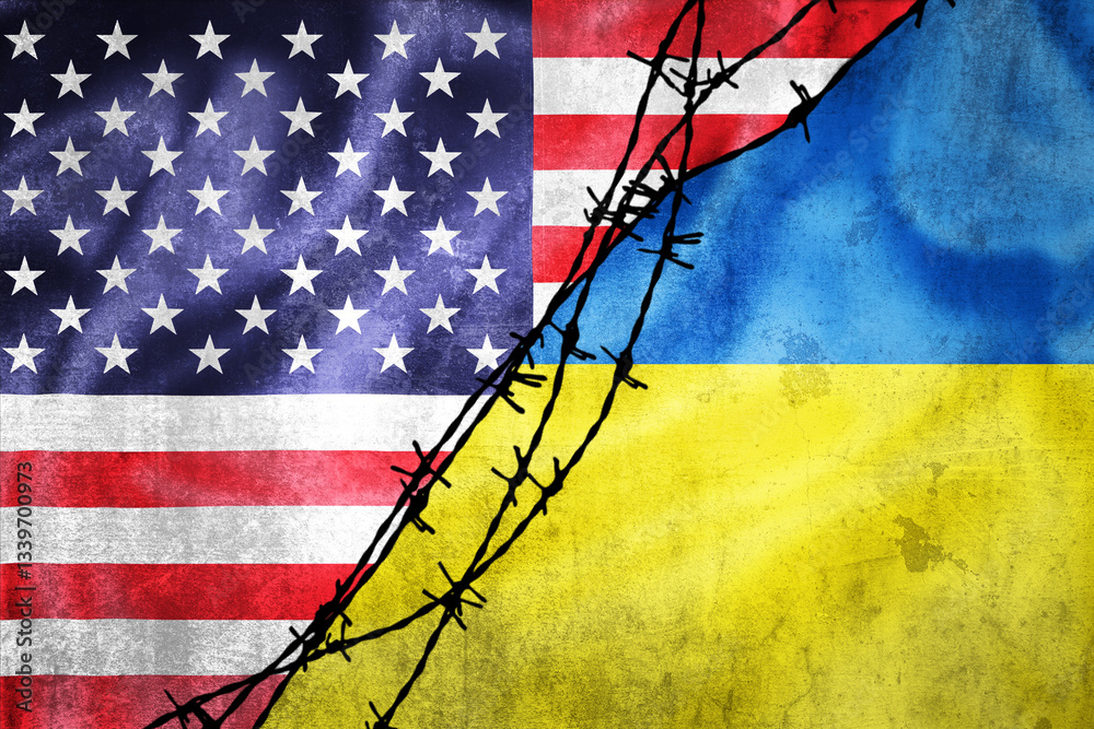 Grunge flags of USA and Ukraine divided by barb wire illustration