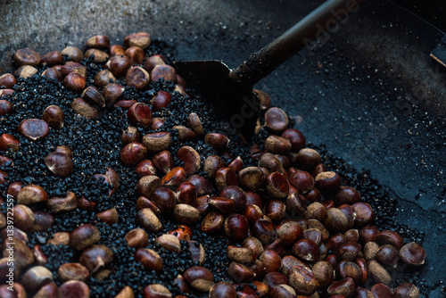 Close-up of chestnuts roasting on an open fire in Hong Kong