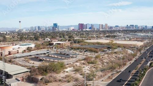 Aerial drone view of Las Vegas city skyline with residential homes and trees 12