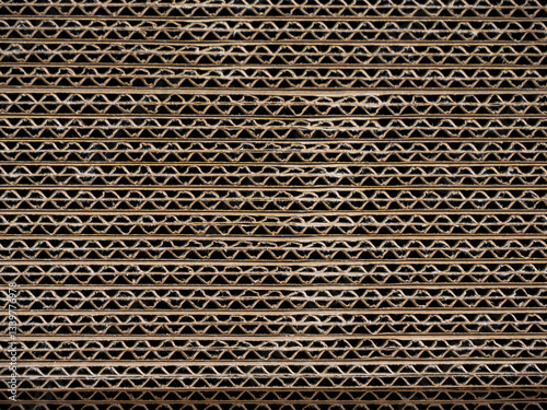 Stacked corrugated cardboard boxes background, close up view