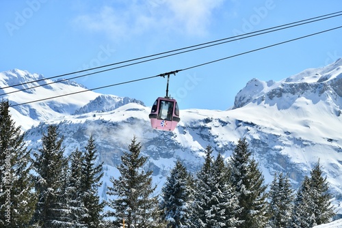 Ski lifts going up and down in Courchevel ski resort