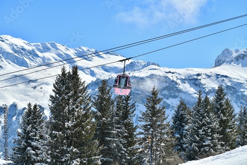 Ski lifts going up and down in Courchevel ski resort