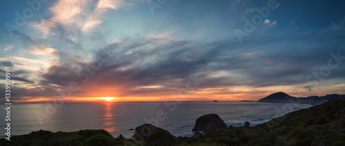Panorama Sunset over the Pacific Ocean on the Southern Oregon Coast. 