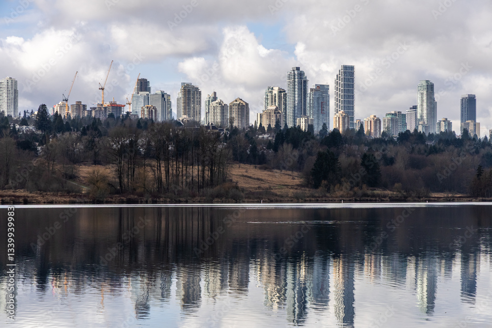 Obraz premium Skyscrapers Reflecting on Deer Lake in Burnaby, Vancouver, BC, Canada