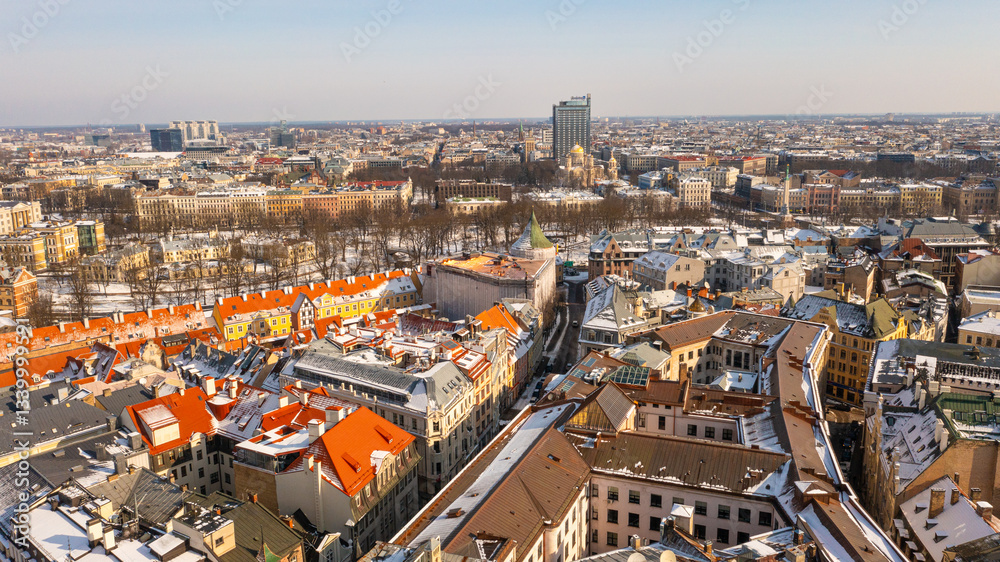 Obraz premium Riga, Latvia, Beautiful panoramic aerial photo from drone to Old Riga on a beautiful sunny winter day. (series)